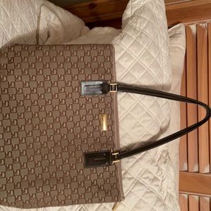 St John tote 16”x12” in brown tones. Excellent condition.